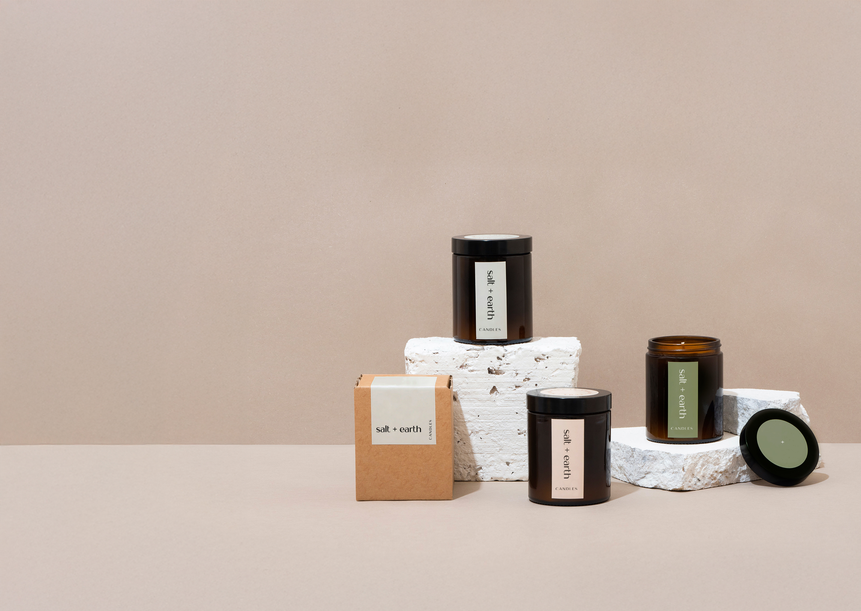 Salt and Earth Candles, Branding and Product Design. Image Mock up showing candles with branding